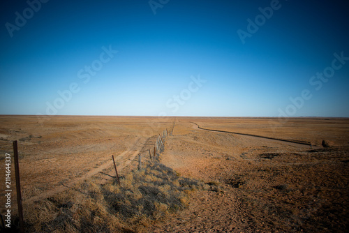 Schilderij op canvas Australia, The Dingo Fence, built in the 1880s, is the longest fence in the world