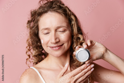 Obraz na plátně Authentic beauty of a middle-aged woman with natural skin without retouching