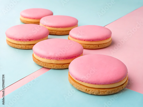 Mauritian Napolitaine sandwich cookies with pink icing, colorful minimal styling
