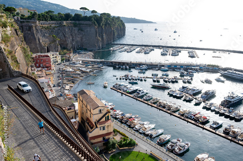 Fotografie Scenic high-angle view of Marina di Cassano beach and port in Piano di Sorrento, Sorrento Peninsula, Italy