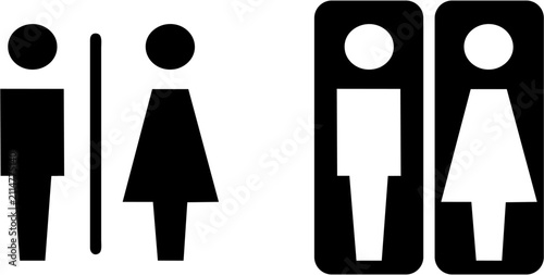 Restroom signs featuring male and female pictograms provide clear wayfinding directions for public facilities and gender-neutral accessibility.