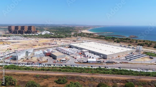 Hyperscale data center facility and adjacent construction site near the coast in Portugal. Moving Upwards