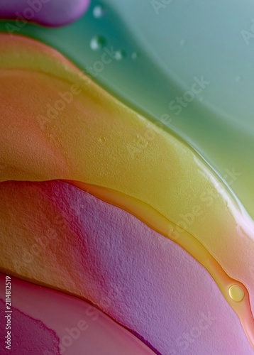 Close-up of a colorful abstract background. the background is made up of different shades of pink, orange, yellow, and green, creating a gradient effect.
