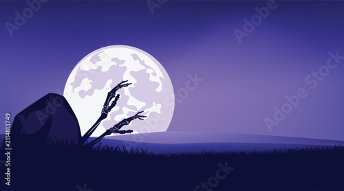 Foto two skeleton zombie hands raised from under the ground and grave stone at night