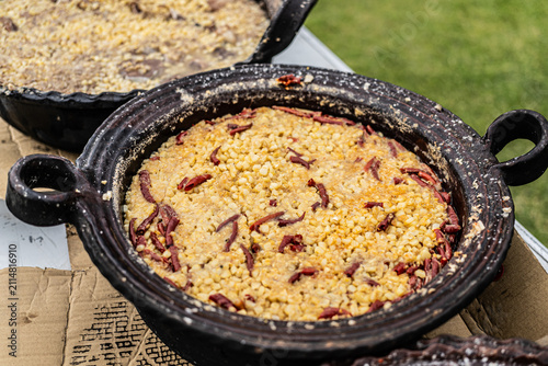Traditional Mexican Esquites Cooked in Clay Pot with Corn and Dried Chili Peppers