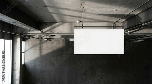 Blank Rectangular Sign Hanging From Ceiling In Industrial Style Room With Concrete Walls And Exposed Pipes