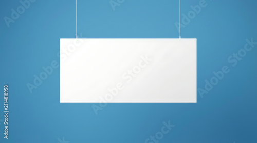 Blank Rectangular Signage Hanging From Ceiling Against A Blue Wall Background In An Indoor Environment Ready For Text Or Graphics
