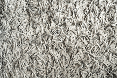Obraz na płótnie Close-up macro texture of a soft grey shaggy carpet or rug