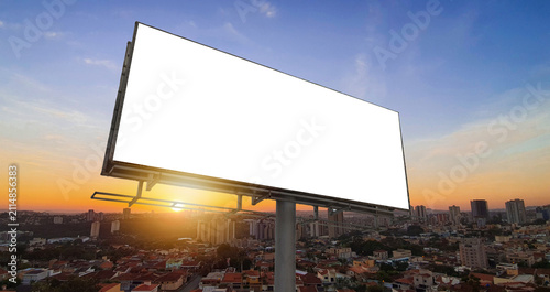 Blank White Billboard Mockup on Modern City Skyline Background Sunset