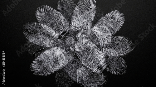Macro close up of human fingerprint texture imprinted on dark natural organic leaf surface