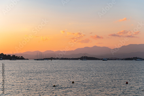 Peaceful sunset over the bay and mountains in Fethiye, Turkey