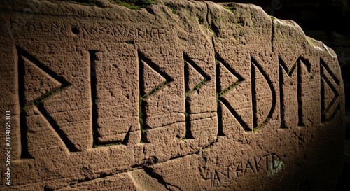 ancient stone inscription carved with a chisel