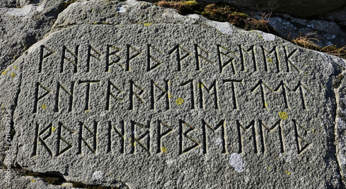 ancient stone inscription carved with a chisel