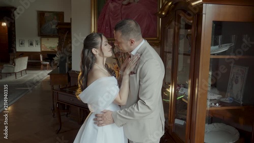 A couple in love, a man and a woman, hug and kiss.