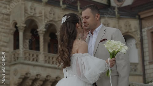A couple in love, a man and a woman, hug and kiss.