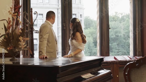 A couple in love, a man and a woman, hug and kiss.