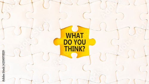 What do you think words symbol. Concept words What do you think on beautiful yellow paper. Beautiful white puzzles background. Business What do you think motivational support concept. Copy space.