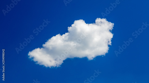 Картината върху платно isolated white cloud in the middle of deep blue sky