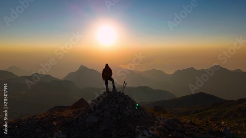 Sunrise Silhouette On Mountain Peak