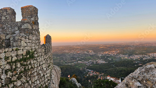 Konstfotografi Ancient Moorish castle wall foregrounding a vast panoramic view of Sintra city a