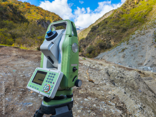 Digital total station surveying instrument in mountainous terrain