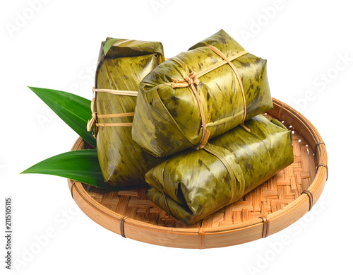 Khao Tom Mat Traditional Thai Sticky Rice Wrapped in Banana Leaves on Woven Tray