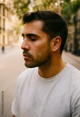 Young man with closed eyes ...