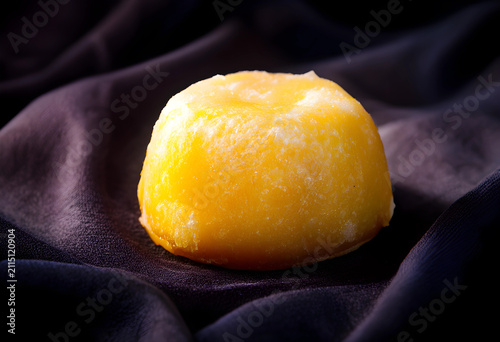 Frozen yellow dessert on da...