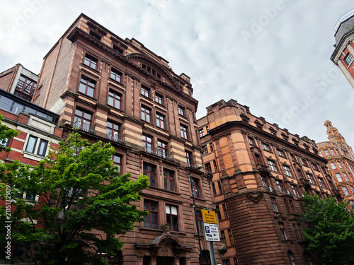 Принти на полотні Ornate Victorian red-brick commercial buildings on a Manchester, UK city street