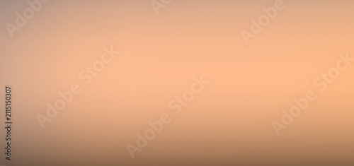 Light brown peach and pastel yellow warm soft gradient background