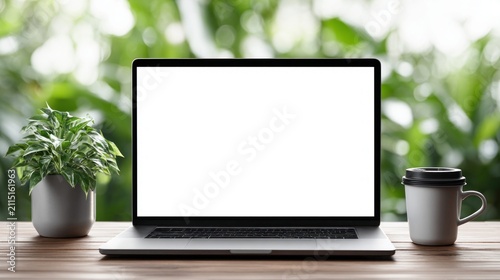 Modern laptop with a potted plant and coffee cup on a wooden desk outdoors