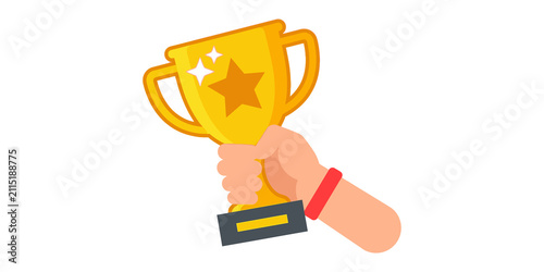 Fotografía Person hand holding golden trophy cup award with star and sparkles