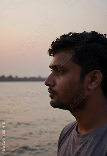 Young indian man in profile...