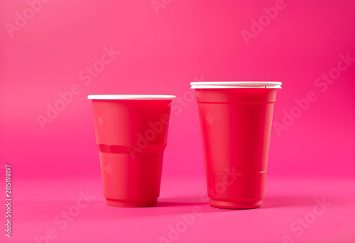 Two red plastic party cups ...