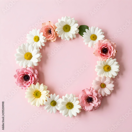 Floral wreath of white dais...
