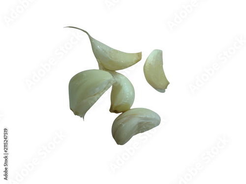 Fresh peeled garlic cloves on a flat surface