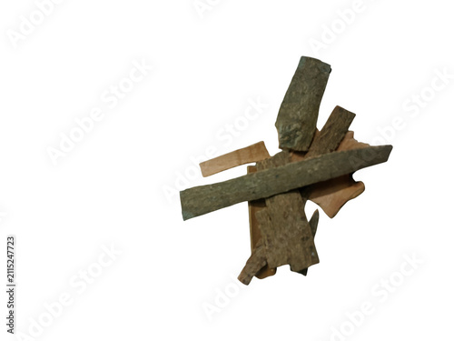 Stack of dry wooden logs and bark pieces for campfire