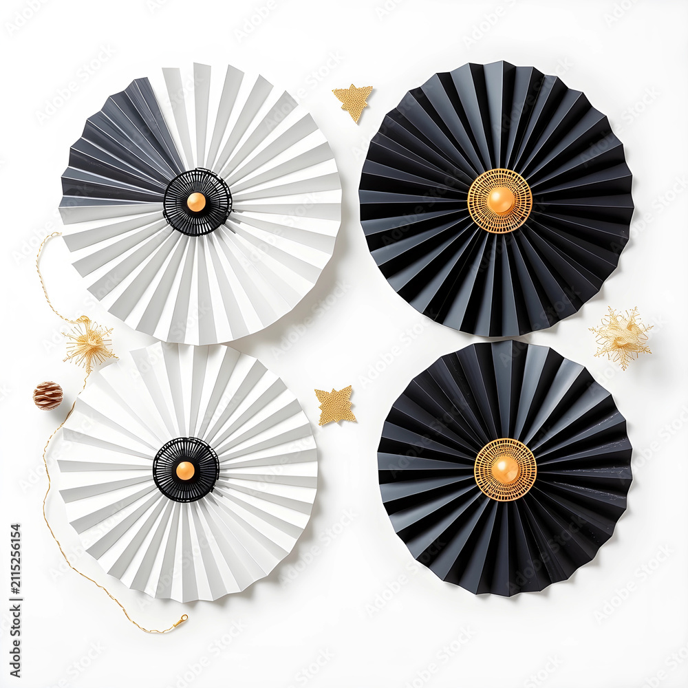 Obraz premium Black and white paper fan decorations with gold accents and festive ornaments on a clean background, this elegant display features a minimalist design