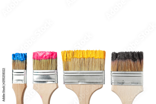 Bild auf Leinwand CMYK colors. Brushes with paint isolated on white, set