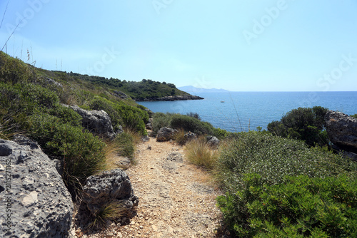 Scenic view of the rocky coast and Mediterranean vegetation along the Porto Cofaniello trail in Gianola Park (Riviera di Ulisse), Italy