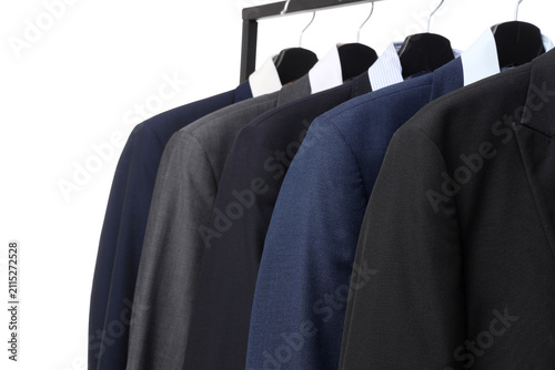 Rack with male suits on whi...