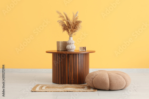 Wooden coffee table with pa...