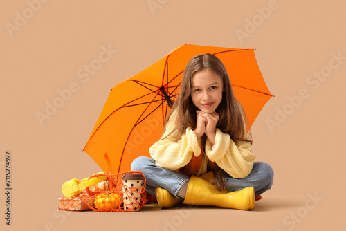 Cute teenage girl with oran...