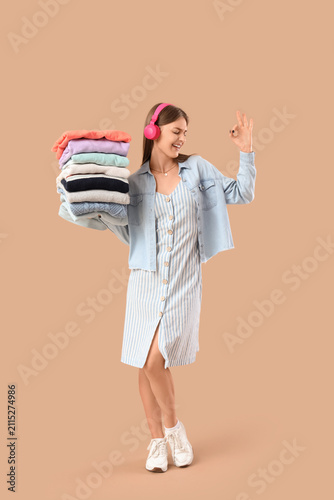 Young woman in headphones w...