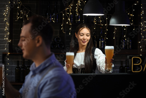 Young happy couple in tradi...