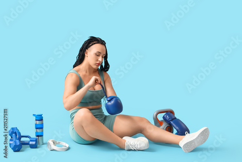 Female bodybuilder with spo...