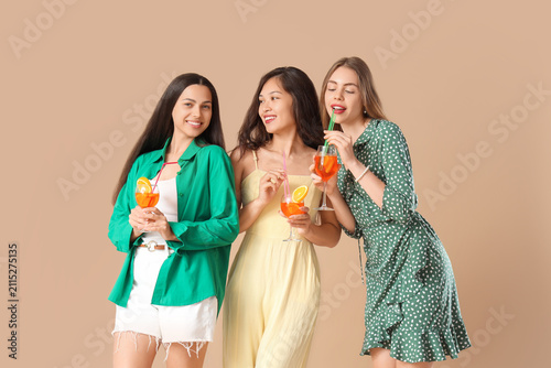 Young women with aperol spr...
