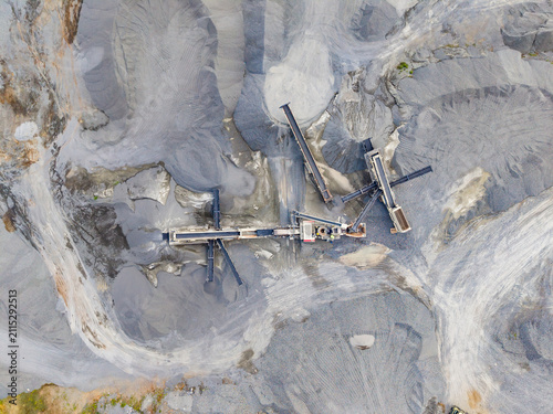 Fotografie Granite quarry site showing machinery and extraction process at work in a large
