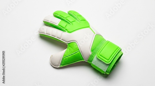 Vibrant green goalkeeper glove displayed on a clean white backdrop