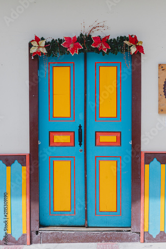 Colorful Door Decorated with Christmas Garland in Salento